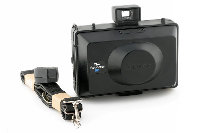Polaroid The Reporter SE Camera Includes Original Timer and Neck Strap