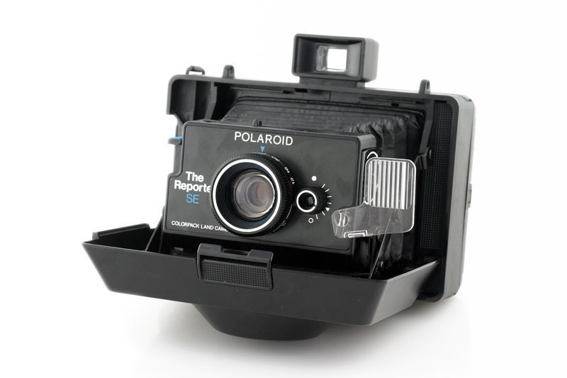 Polaroid The Reporter SE Camera Includes Original Timer and Neck Strap