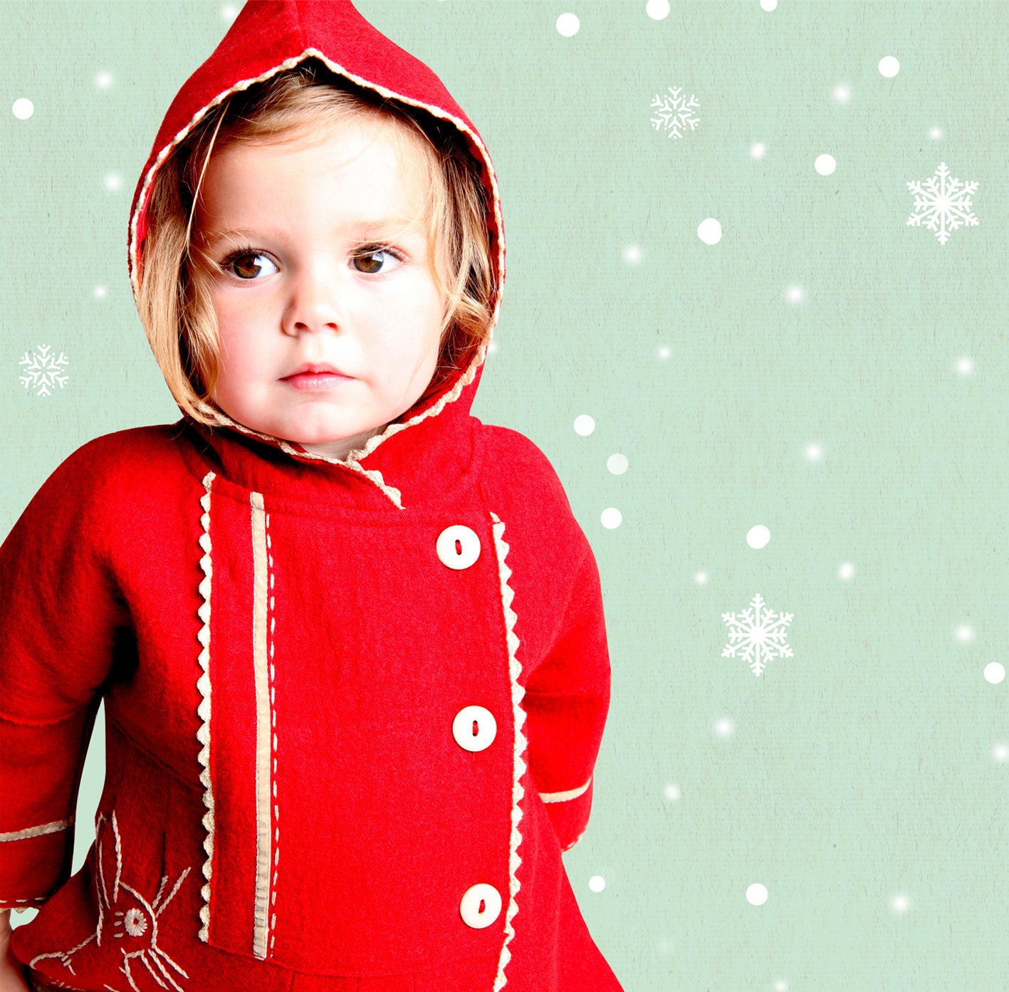 Boo Crimson Coat Little girl in read coat with bunny detail on the pocket
