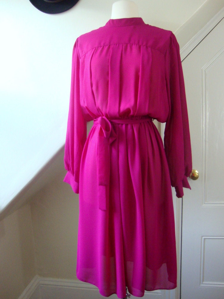 fuchsia swing dress with high collar and pleating details /  1970s/ m/l/xl