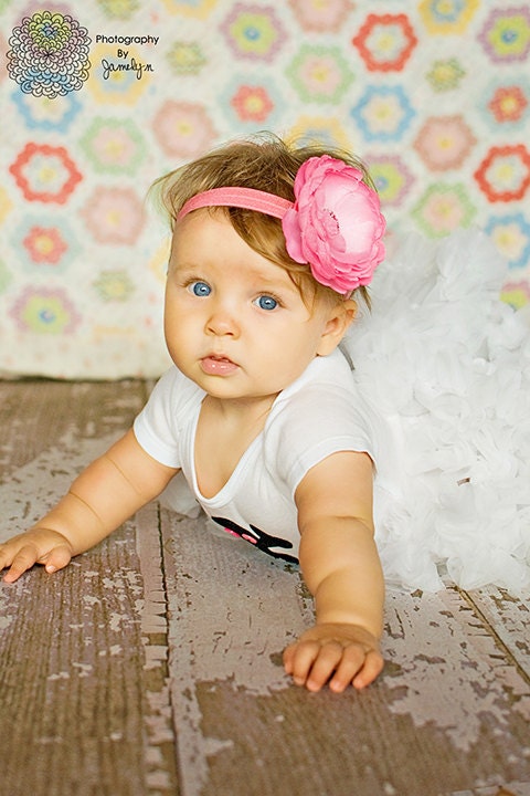 Rhinestone adorned pink flower hair clip with headband