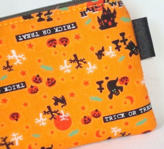 Halloween Cemetery Ghosts Zippered Pouch  Orange by WolfBait from etsy.com
