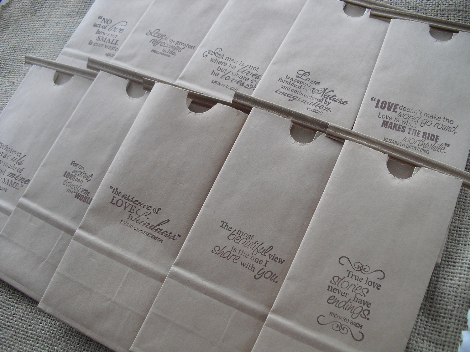 Famous loved quotes rubberstamped onto kraft paper lunch bags