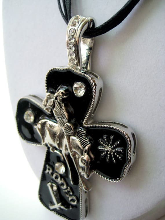 RIDE 'EM COWGIRL: Rodeo cowgirl magnetic cross pendant on leather cord necklace