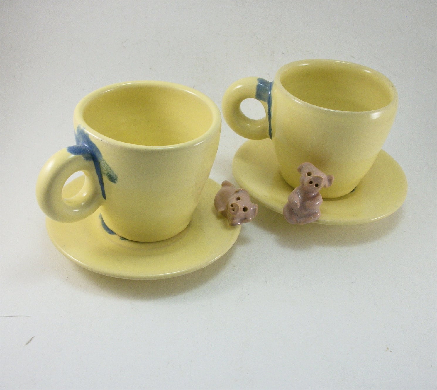pair of pig cups and saucers with pigs for kids or espresso