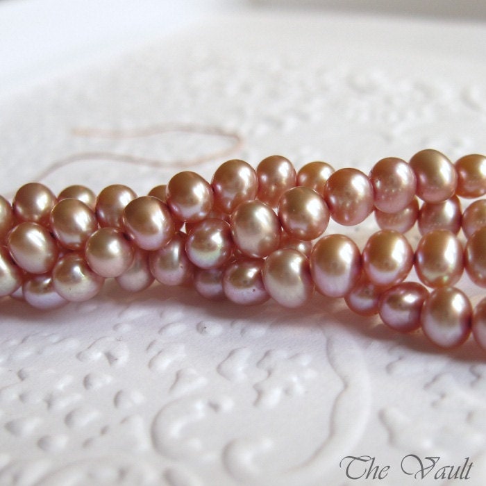 Freshwater pearls in pink, 4-5mm potato, 16 inch strand