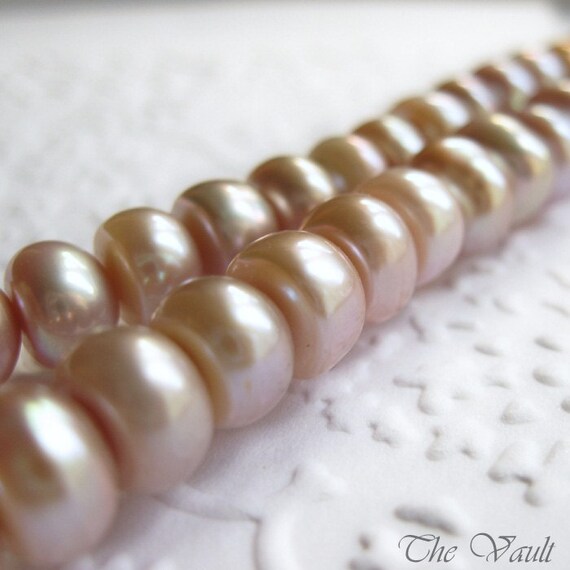 8mm pink freshwater pearls, center drilled buttons, full strand 15 inches, last one