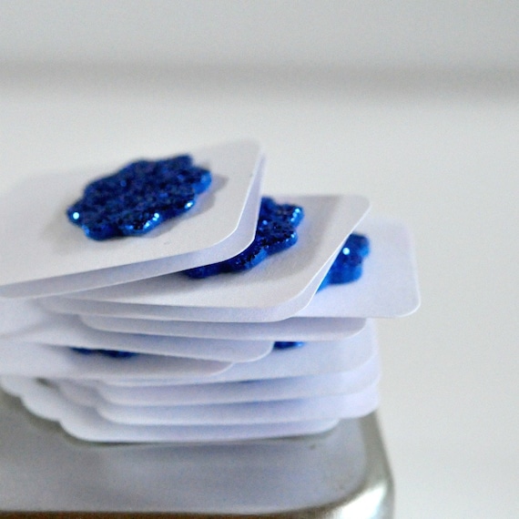 12 Blue Glitter Sunburst Mini Tags Threaded White