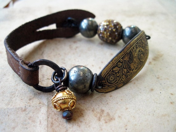The End of Greatness. Rustic Assemblage Bracelet with Antique Leather and Damascene.