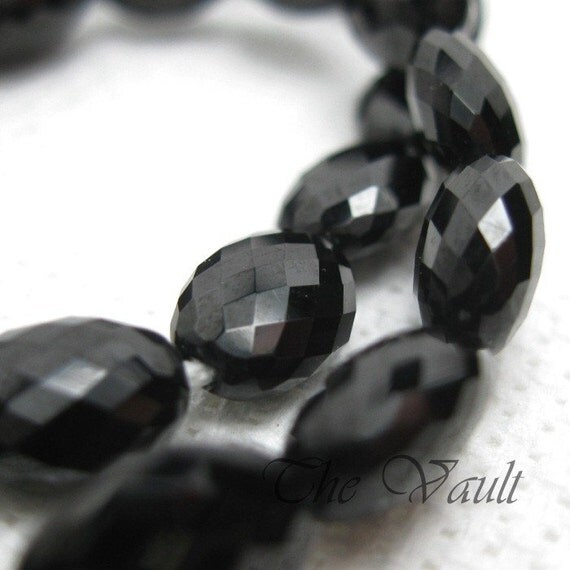 4 Black Spinel 9-10mm faceted flattened oval beads