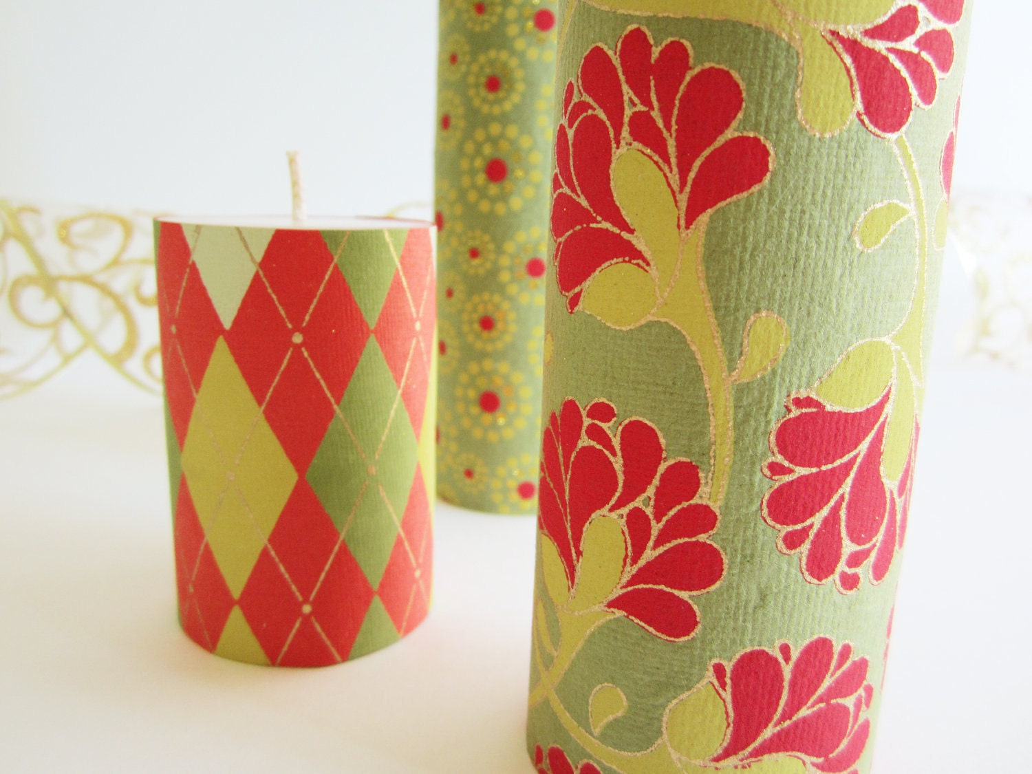 Set of Three Pillar Candles Wrapped and Decorated for the Holidays with Handmade Indian Paper: Argyle, Floral and Concentric Dots on Moss