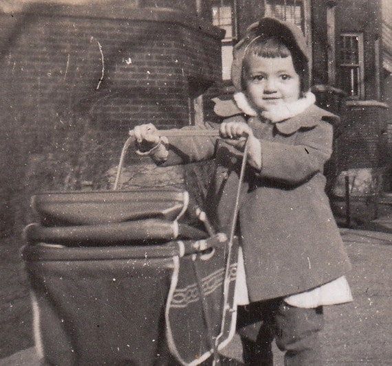 Pushing Dolly in a Stroller- 1940s Vintage Photograph