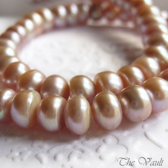 8mm pink freshwater pearls, center drilled buttons, full strand 15 inches, last one