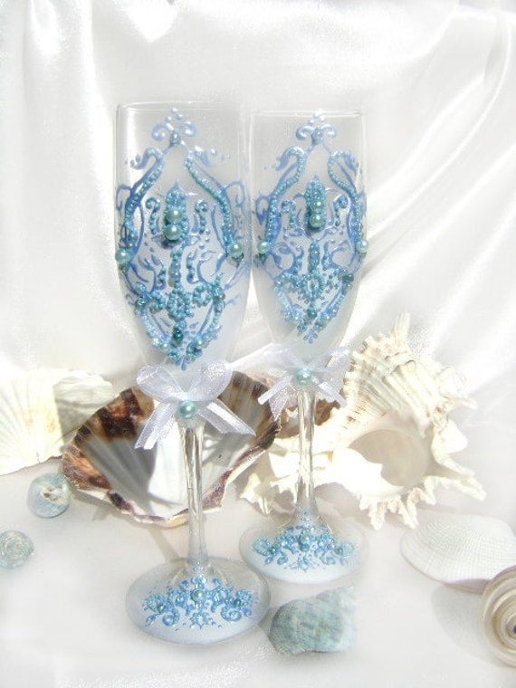 Wedding champagne glasses hand decorated with a tiffany blue damask on a 