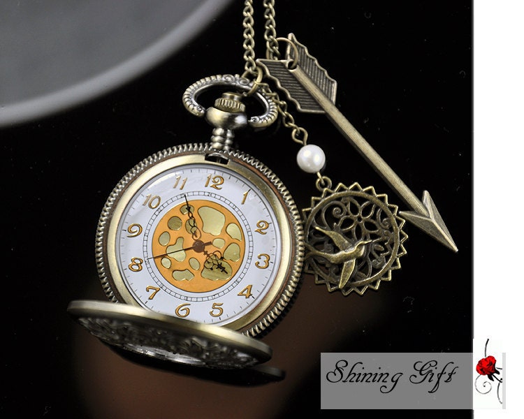The Hunger Games Inspired Arrow,Mockingjay,and Peeta Pearl Victorian pattern golden dial Pocket Watch locket Necklace