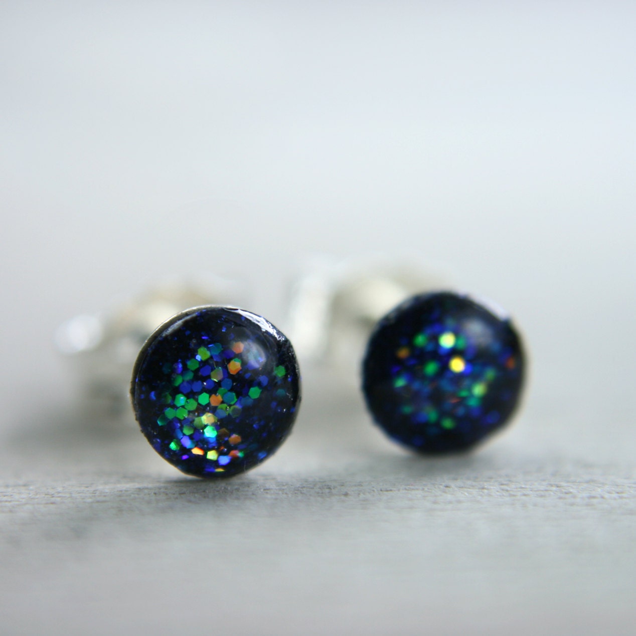 super tiny circle post earrings in sparkly deep blue galaxy