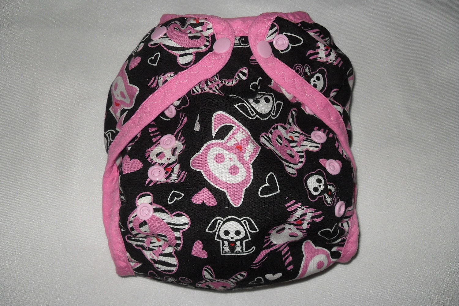 ai2 cloth diaper cover made from skelanimal fabric