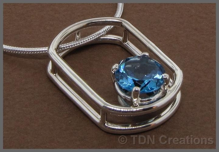 Floating blue Topaz sterling silver Rectangular pendant