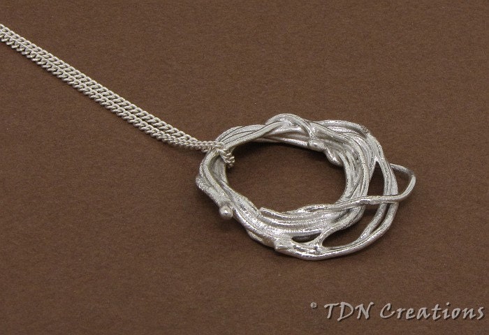 Lasso sterling silver pendant