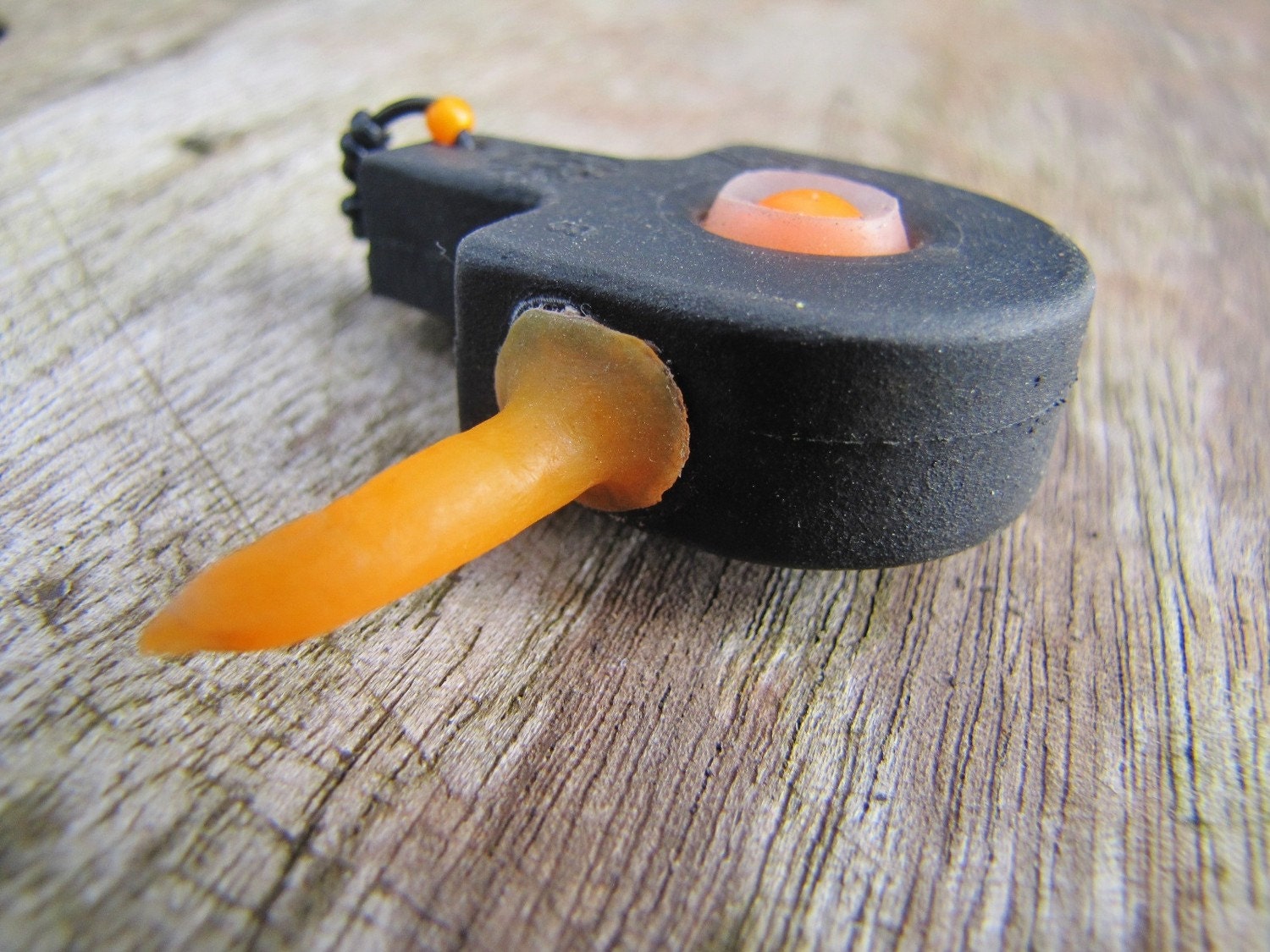 Found object Pendant - recycled UV orange plastic and black rubber