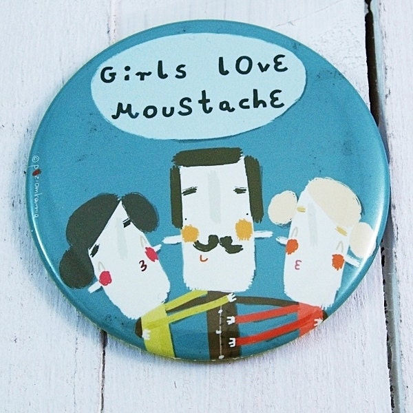 A magnet with funny illustration - Girls love moustache.