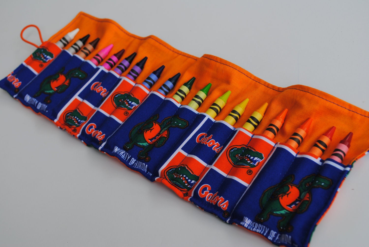 Crayon Keeper Roll Florida Gators holds 18 crayons 8 Crayola crayons included