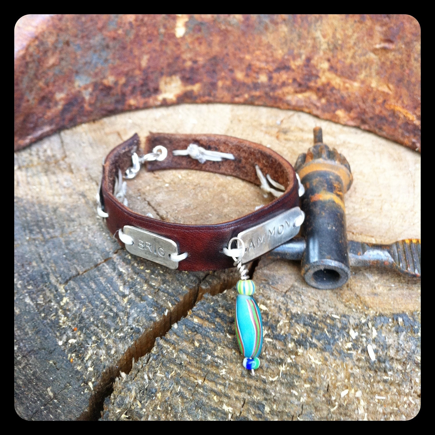 leather word bracelet.