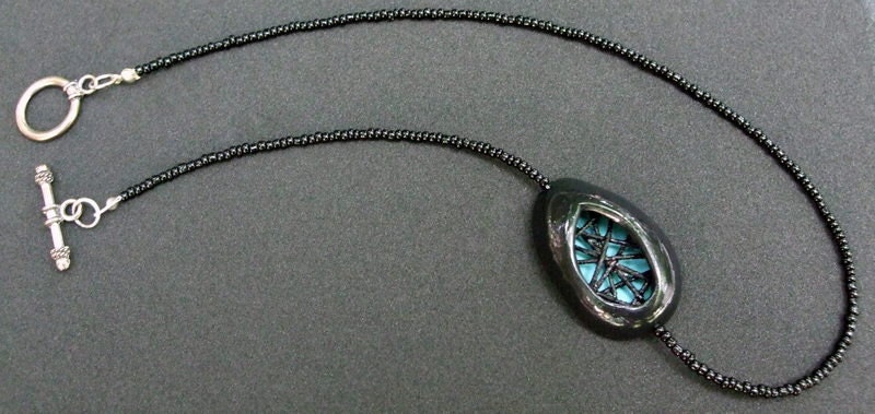 Beaded Necklace with Polymer Clay Pendant - Licorice Fluff