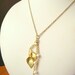 Necklace With Gold Floral Charm And Pearls, Calla Lily