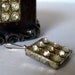 three-squared deco earrings