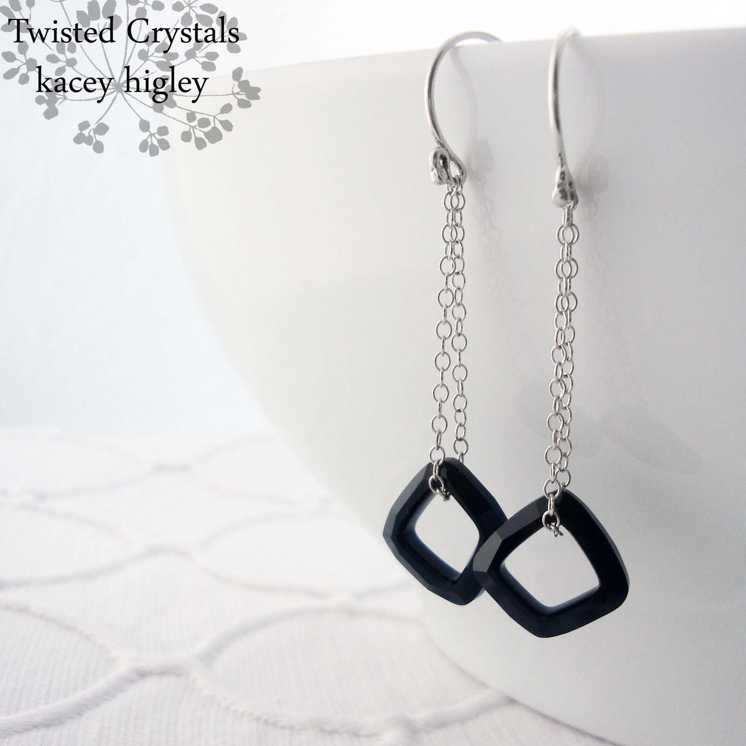 Dainty Swarovski crystal drop earrings in sterling silver and jet black.