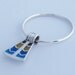 Sterling silver charm ring with enamelled Ancient Egyptian inspired motif