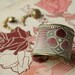 Handmade Antique French Silk Velvet Ribbon Bracelet Cuff in Pink & Gold Art Deco design, embellished with Swarovski crystals