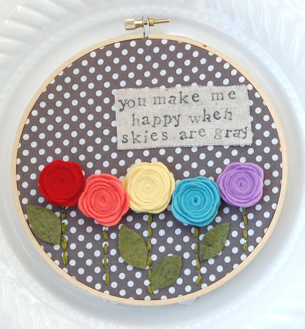 6 inch hoop art: "you make me happy" in rainbow colors.