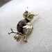 Vintage gold owl brooch designed and signed by Gerry