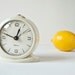 Vintage white mechanical alarm clock Sevani, Soviet Era