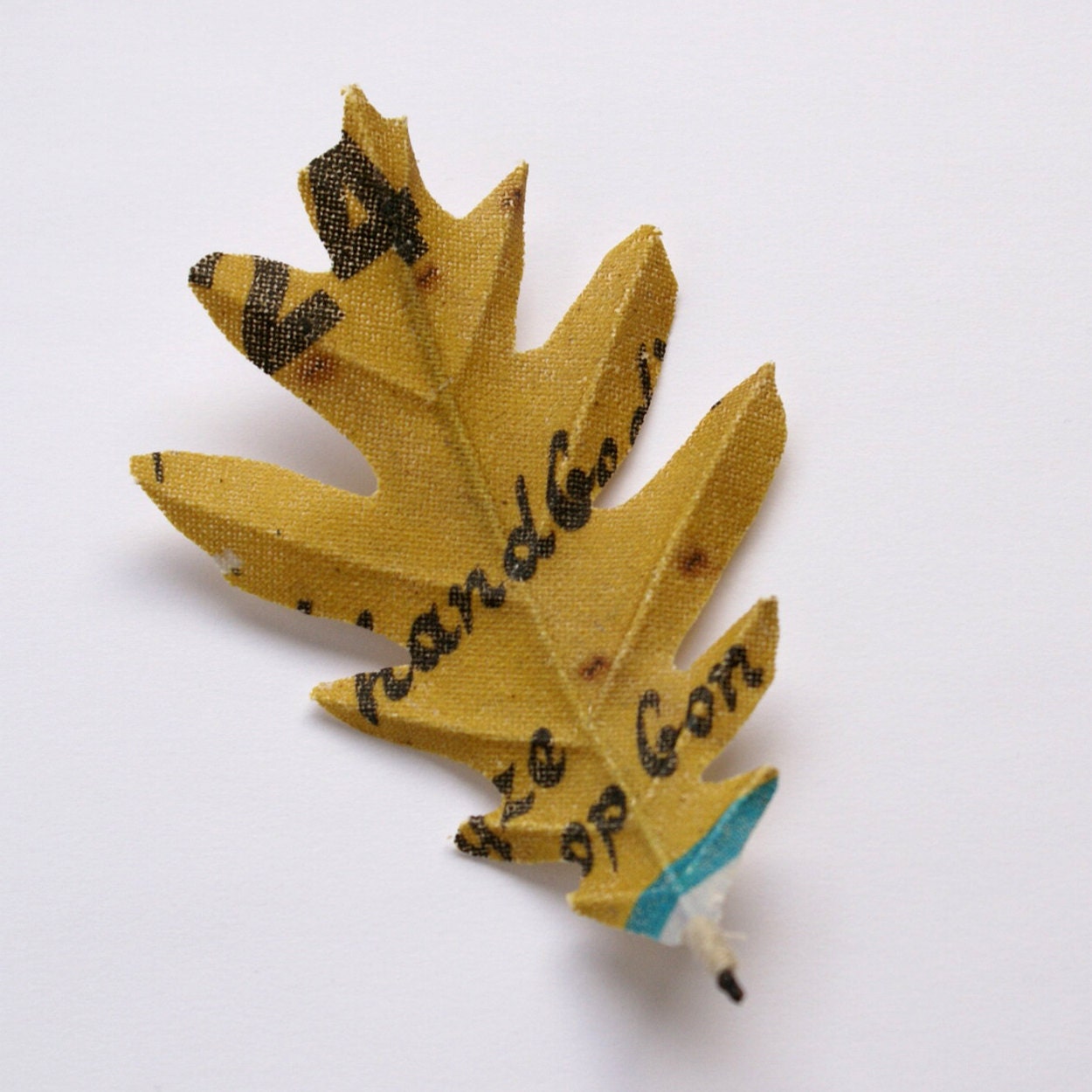 Oak leaf brooch M made of cotton printed with photograph 'old billboard'