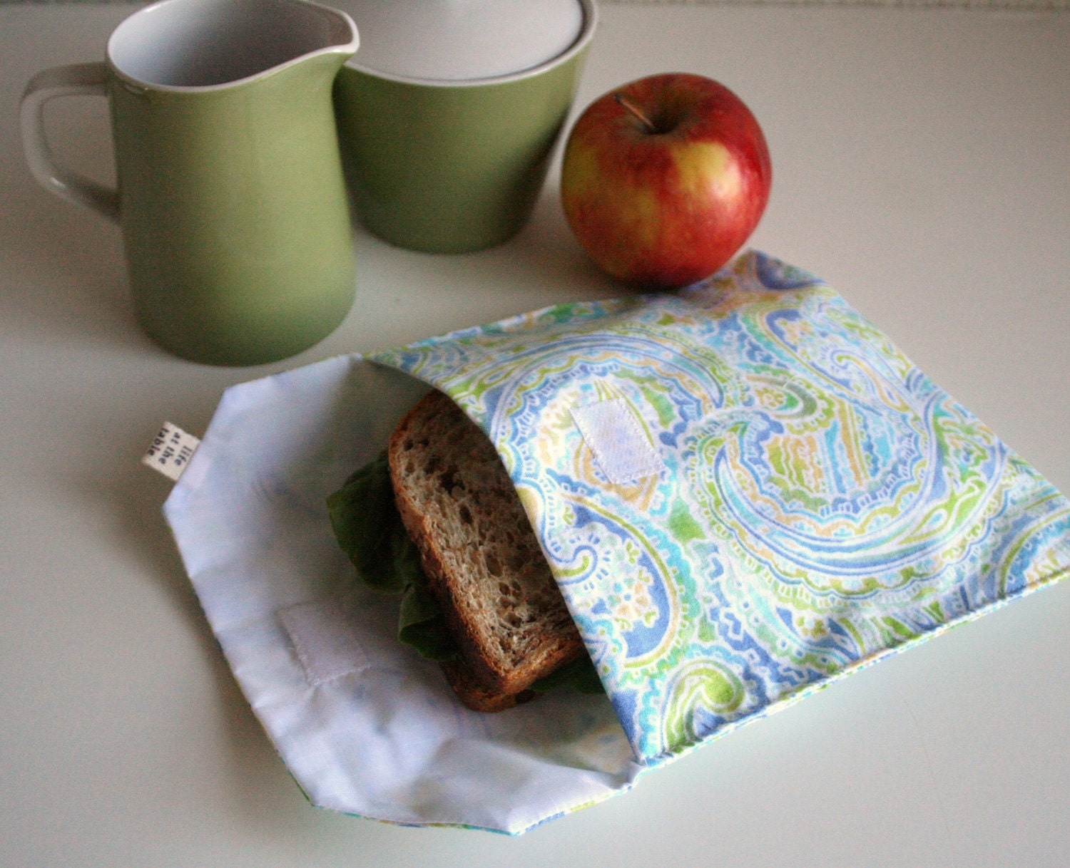 pair of reusable, lined sandwich bags in paisley & yellow dot