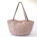 Hand knitted tricolor basket bag with genuine leather straps
