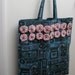 Tote in vintage fabric with yo-yo and cover button trim