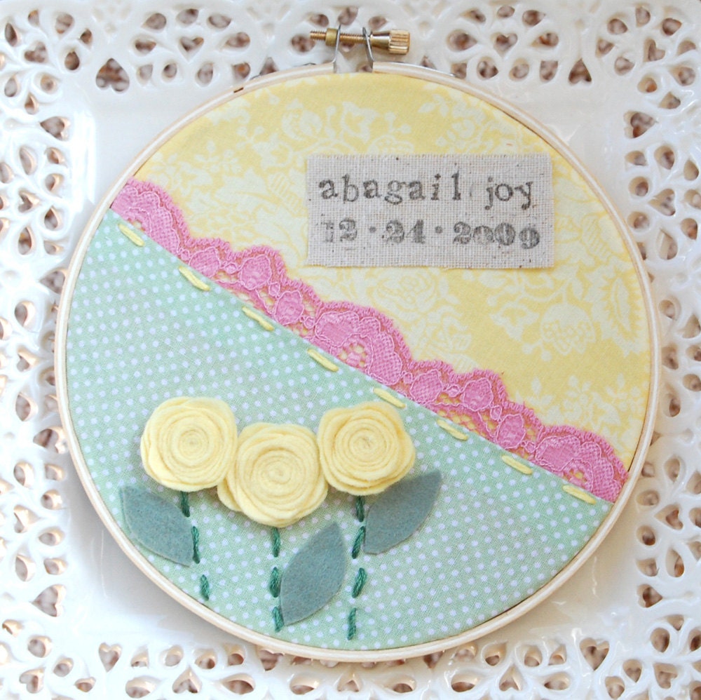 6 inch name and birthdate hoop art in pink, yellow and green. perfect for a girls' nursery or bedroom.