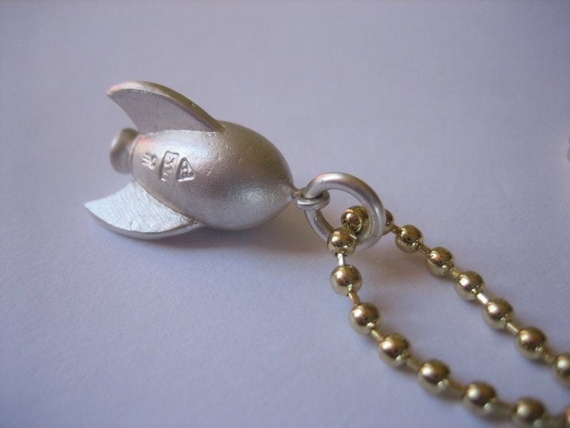 Sterling silver rocket locket, rubber seal