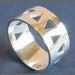 Sterling silver band with triangles