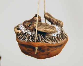 Sleeping Hedge Hog Walnut Ornament
