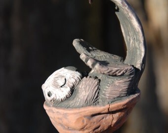 Sleeping Sea Otter walnut ornament