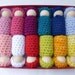 12 wood peg people dressed in wool outfits