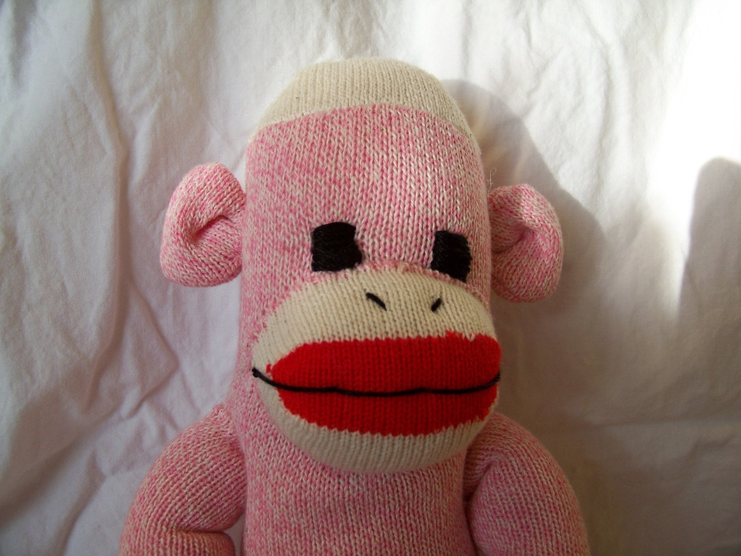 pink sock monkey dog toy