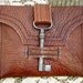 RESERVED for SHAZZASKNITS...Genteel Buffalo Patterned Leather Wallet with Antique Barrel Key