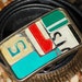 LICENSE PLATE BUCKLE