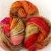 Lunching lions -- (4.8 oz.) merino, baby suri alpaca, latte silk, bamboo, sari silk, sparkle.